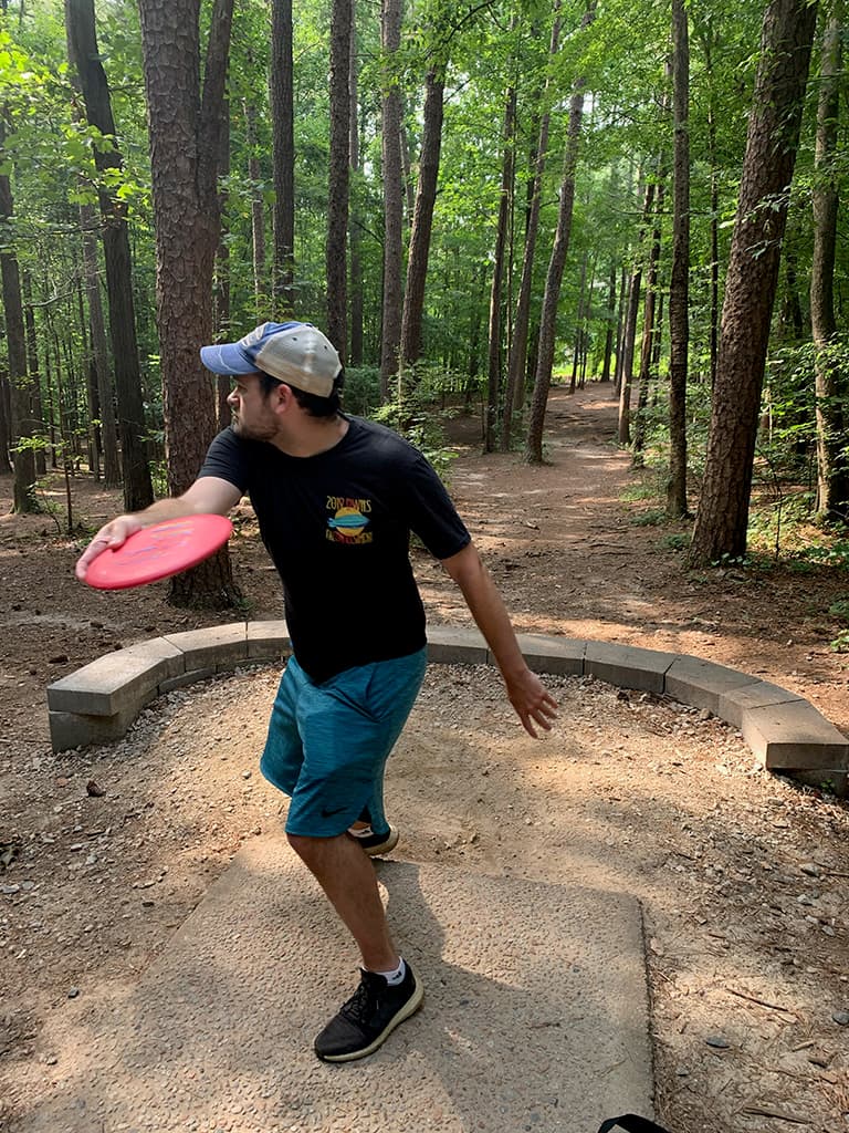 Zach Greenbaum playing disc golf